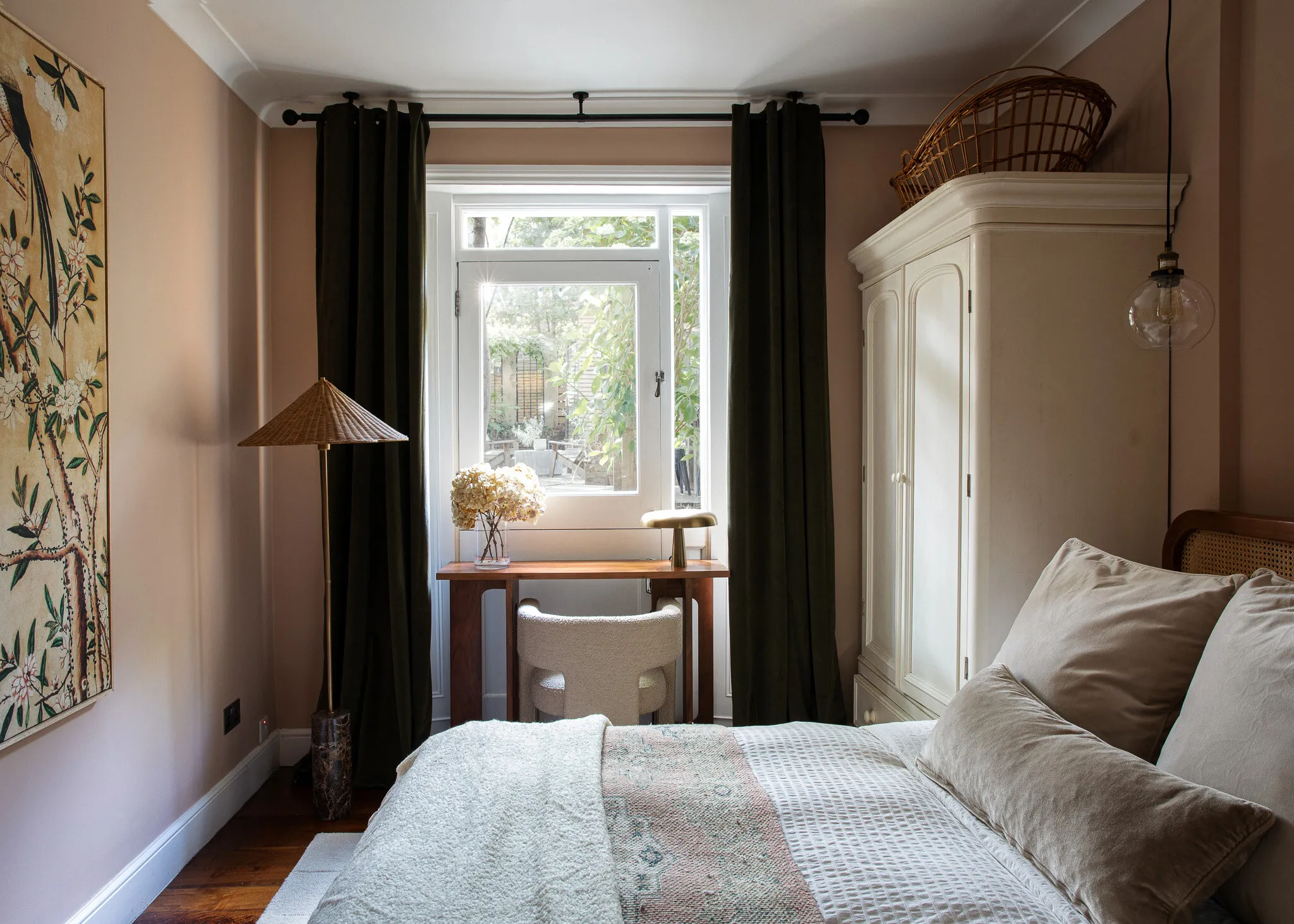 Bedroom with green velvet bed